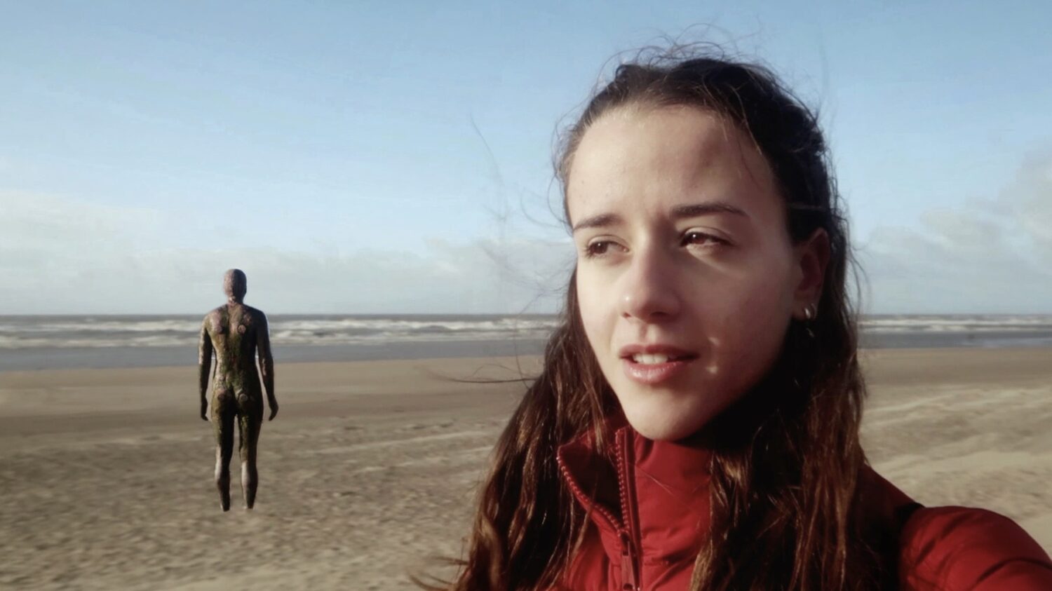 Antony Gormley&rsquo;s iron figures standing on Crosby Beach