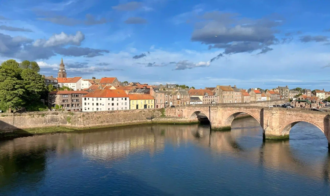 Scenic view of Berwick-upon-Tweed and the Old Bridge over the River Tweed on a sunny day