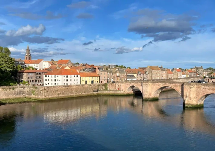 Scenic view of Berwick-upon-Tweed and the Old Bridge over the River Tweed on a sunny day