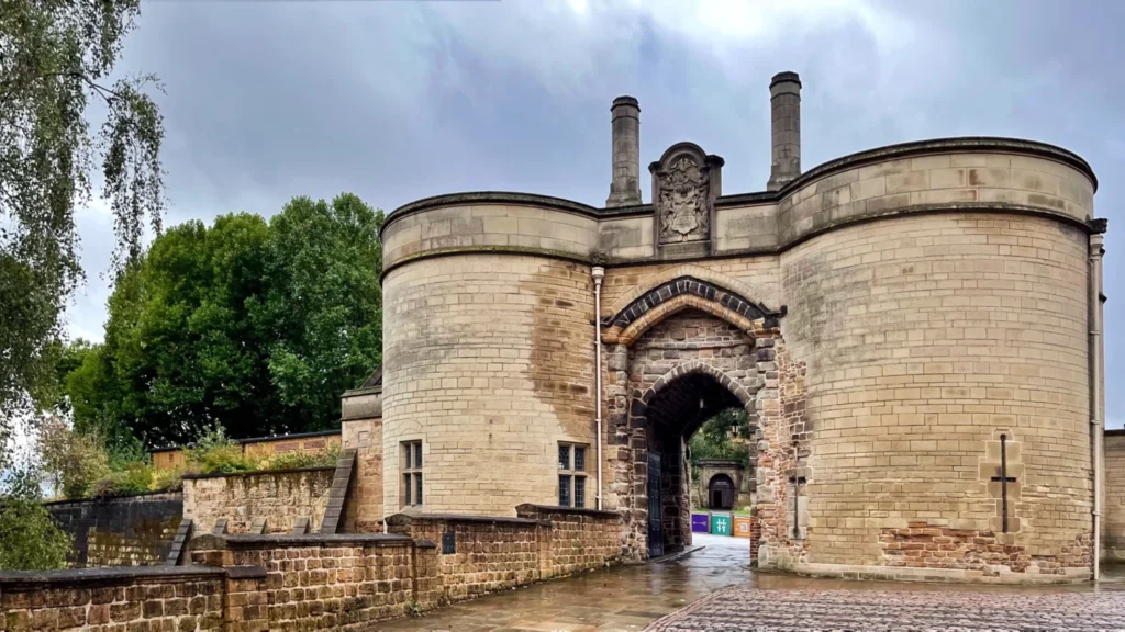 Stone entrance gates of Nottingham Castle on a cloudy day during a weekend in Nottingham