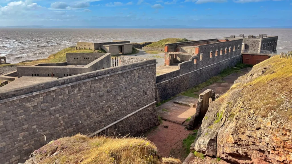Weathered stone and brick fortifications at Brean Down Fort overlooking the Bristol Channel