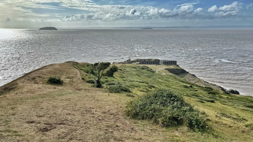 View from Brean Down's southern ridge across the Bristol Channel toward Steep Holm, Flat Holm and the Welsh coast