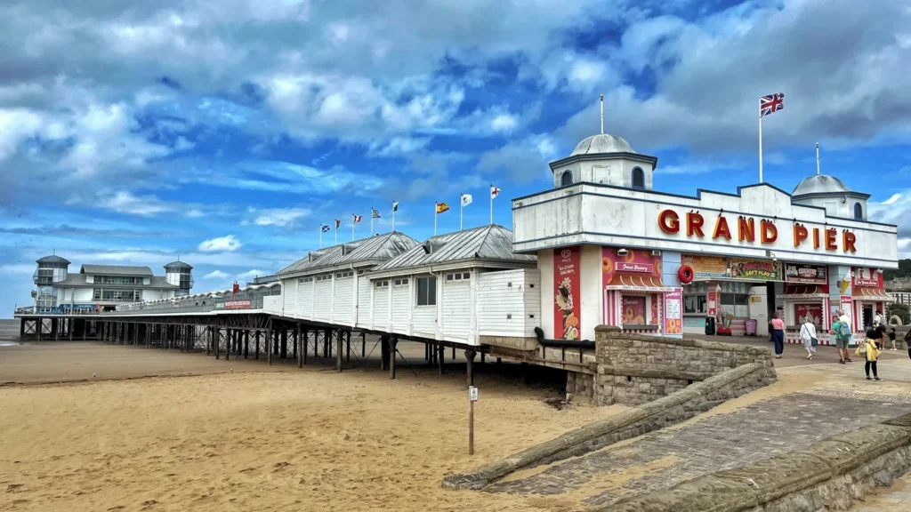Grand Pier sign and entrance building on Weston-super-Mare beach